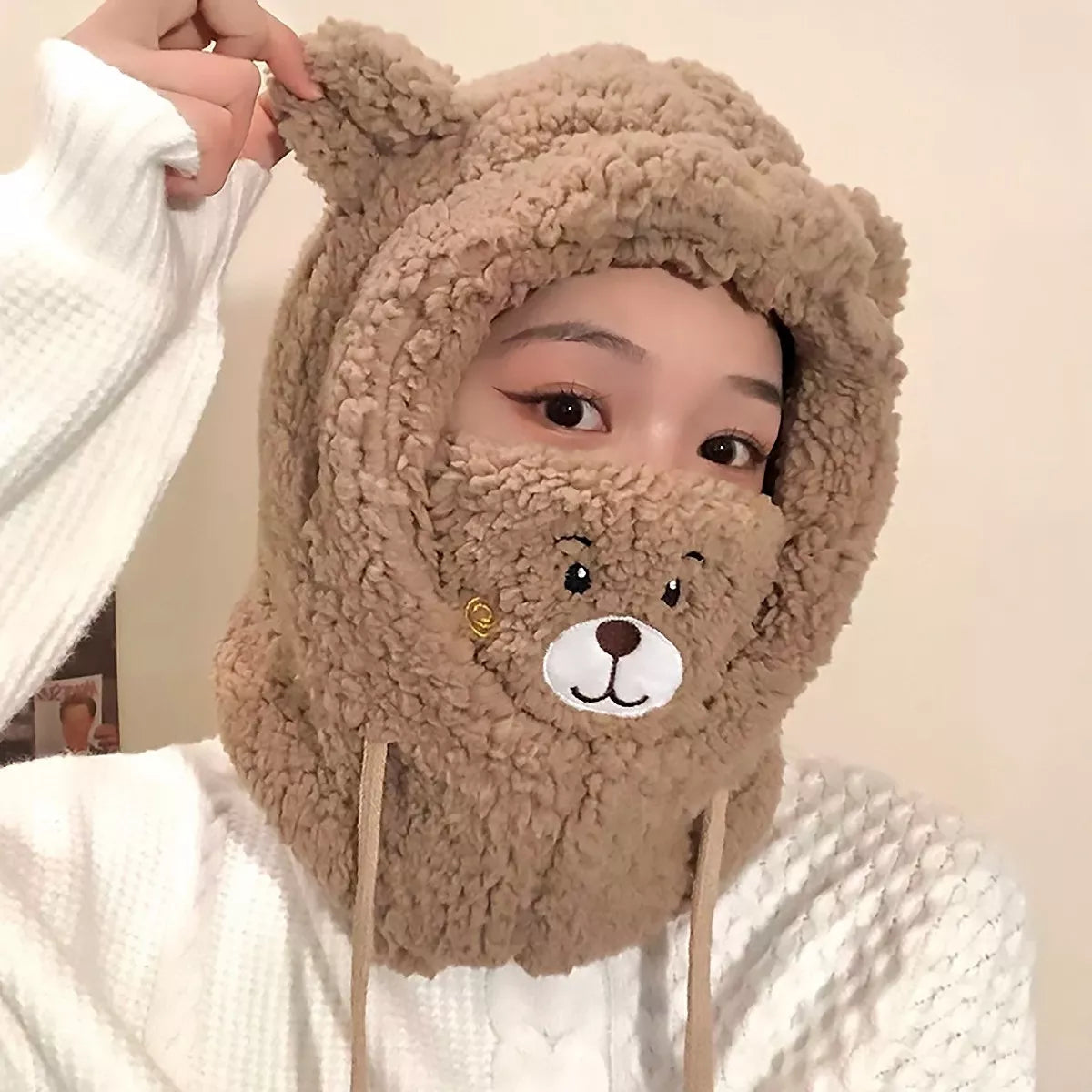 Capa infantil con diseño de oso.