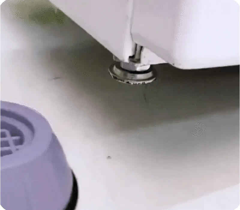 Soporte con chupones lavadora.