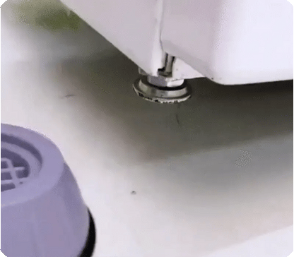 Soporte con chupones lavadora.